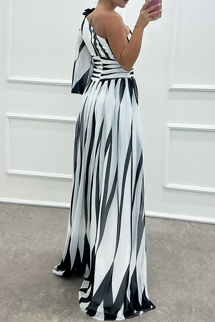 Chic maxi wedding guest dress for women, featuring a sophisticated one shoulder and asymmetric design.
