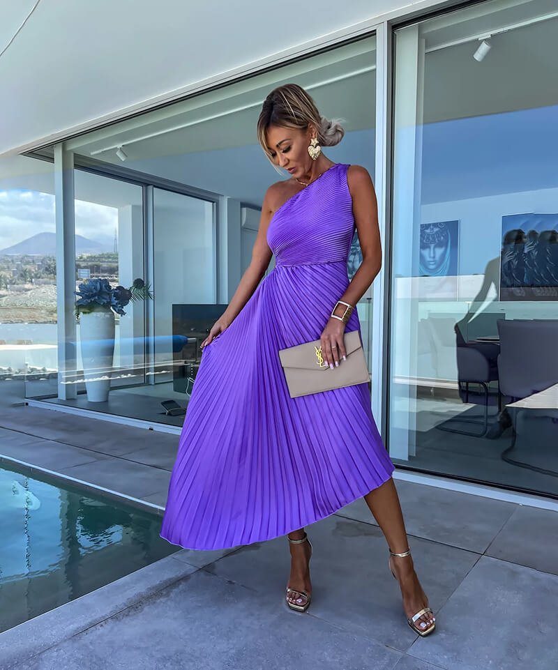 Stylish women's wedding guest dress with one shoulder design & flattering asymmetric midi skirt, suitable for parties.