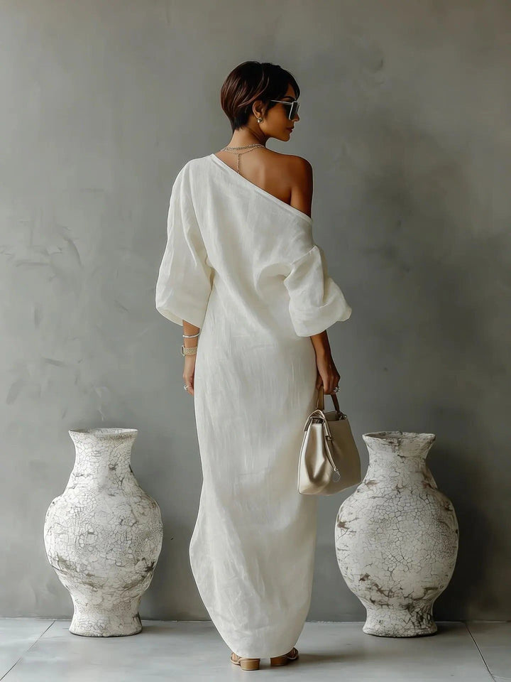 Flowy asymmetrical one-shoulder maxi dress for women with an elegant batwing sleeve, perfect for summer casual wear.