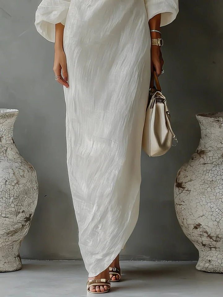 Comfortable and elegant women's flowy one-shoulder maxi dress, great for summer resort fashion and vacation style.
