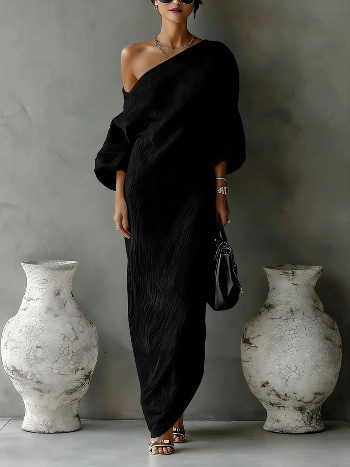 Lightweight women's asymmetrical one-shoulder maxi dress, elegant and flowy, perfect for hot summer days and resort wear.