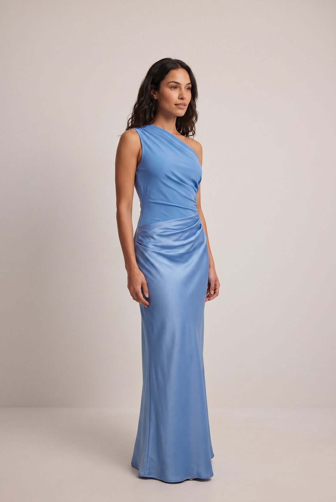 Sophisticated women's one-shoulder evening gown with elegant draping. Ideal party or formal occasion maxi dress.