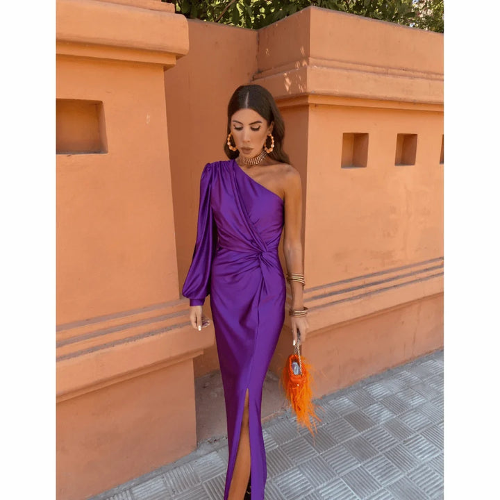 Stunning one-shoulder maxi dress for women featuring an elegant twisted front and high front slit, ideal for parties.