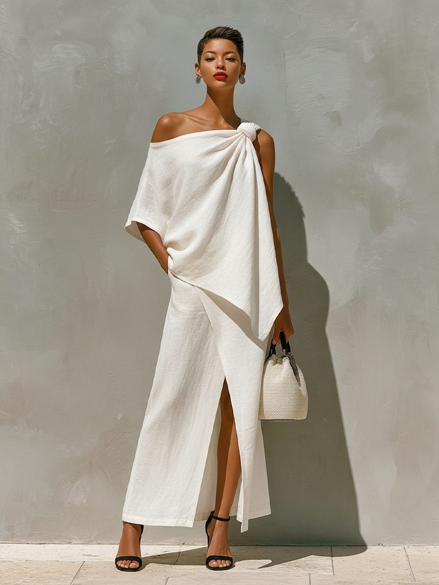 Chic women's one-shoulder top & high-slit maxi skirt set. Ideal for sophisticated summer or resort fashion.
