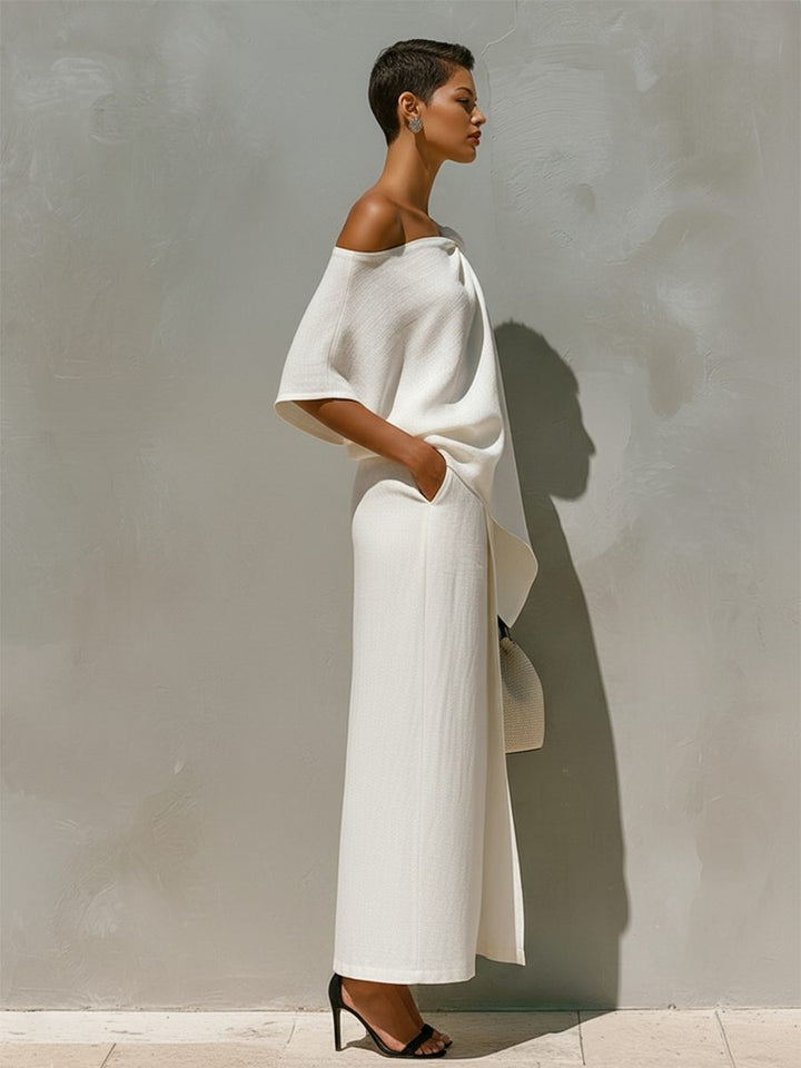 Women's elegant one-shoulder top & front-split maxi skirt set. A chic, versatile outfit for summer and resort wear.