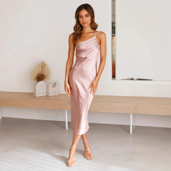 Stylish women's asymmetrical one-shoulder midi dress for evening events & cocktail parties.