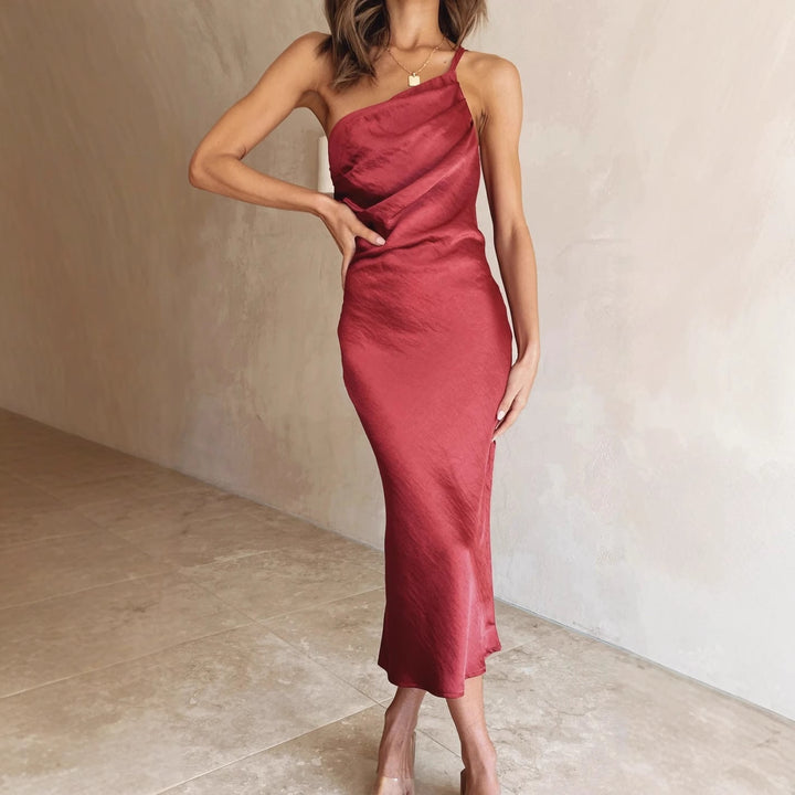 Beautiful women's elegant midi dress with a unique one-shoulder design, perfect for special occasions.