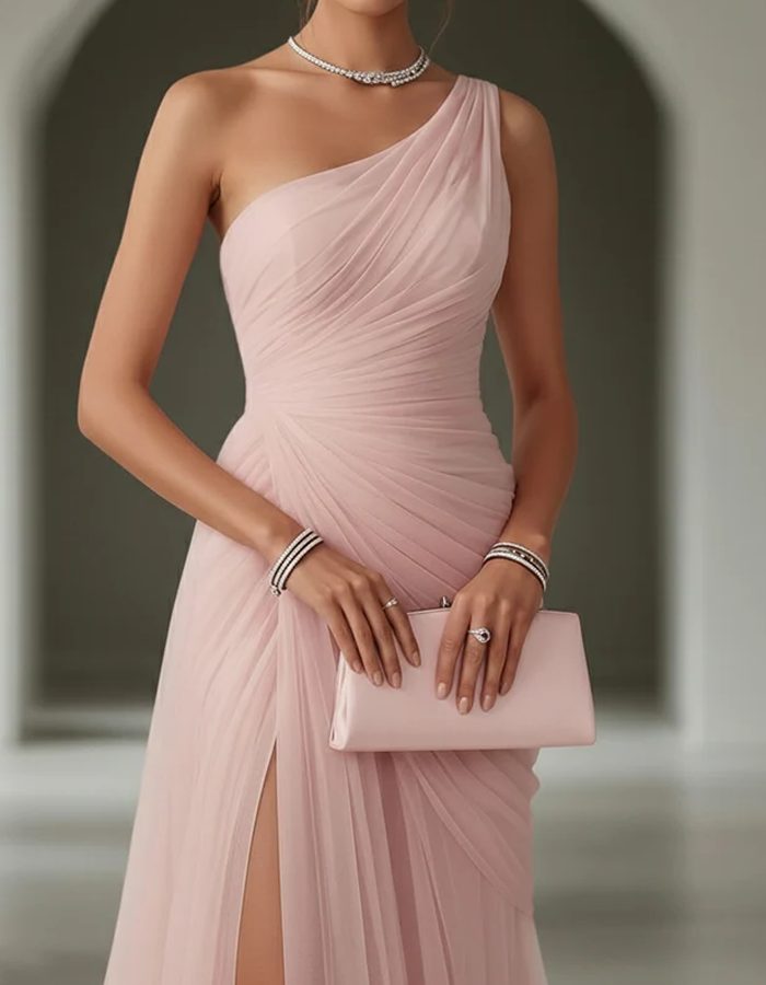 Flowing pleated maxi dress with a sophisticated one-shoulder design, ideal for special occasions.