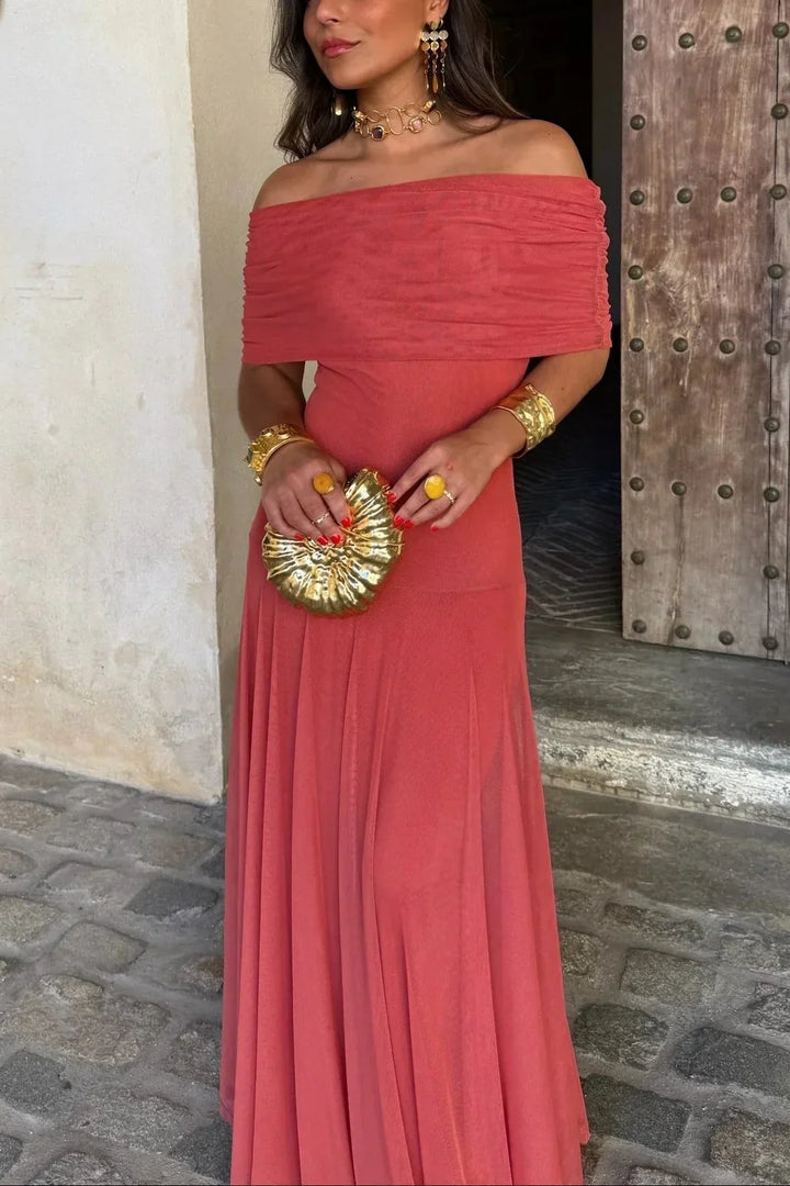 Full-length view of a sophisticated women's pleated one-shoulder maxi dress, perfect for evening parties.