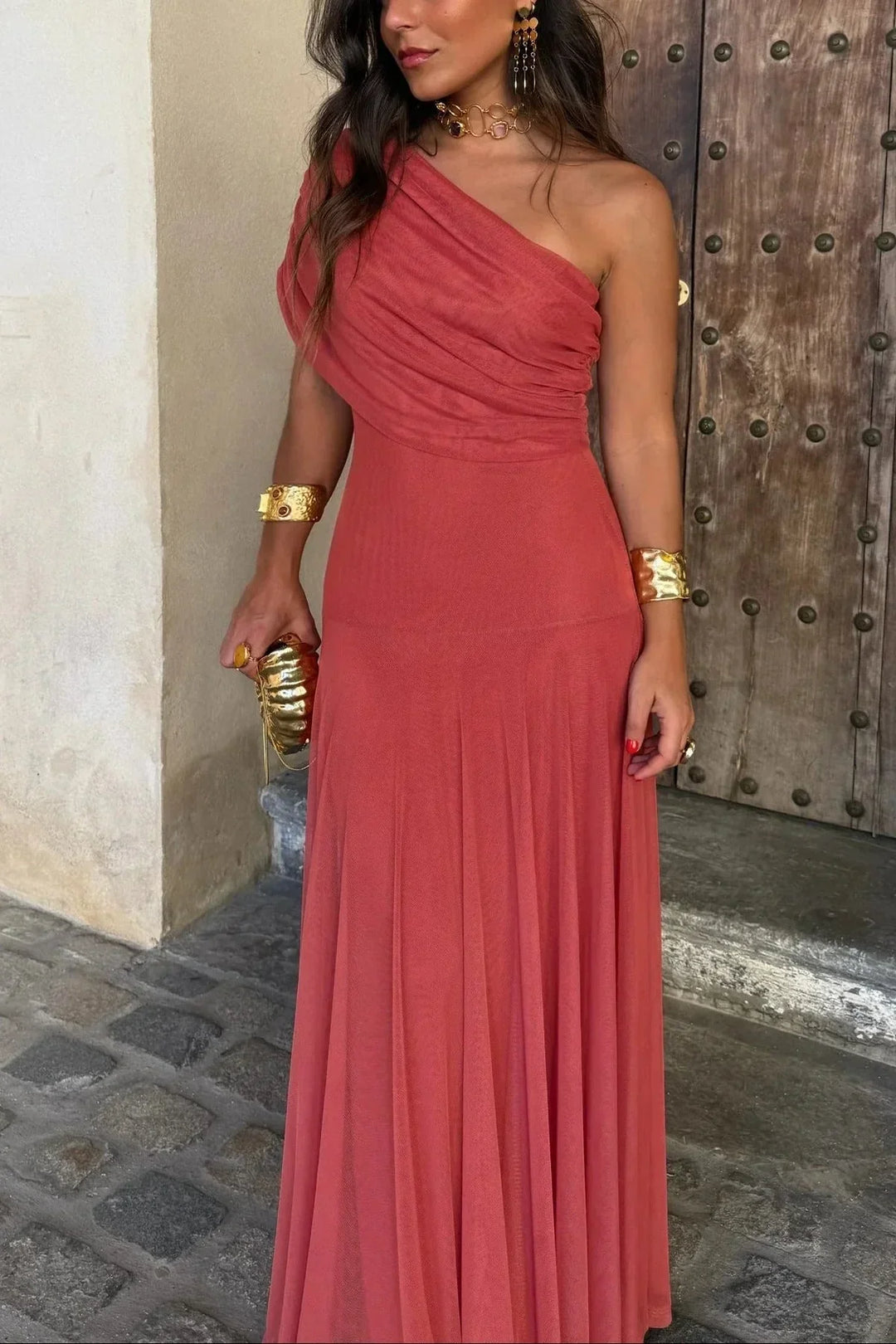 Women's asymmetrical one-shoulder pleated maxi dress, elegant and flowy for wedding guests.