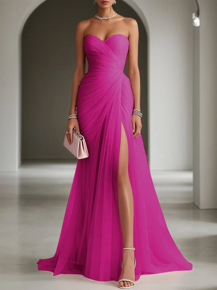 Luxurious pleated maxi dress, one-shoulder style, perfect for a sophisticated wedding guest or formal event.