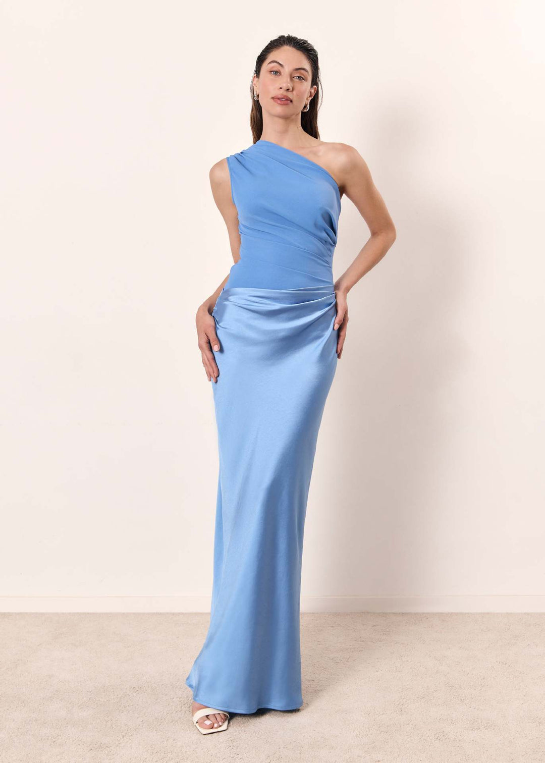 Women's formal one-shoulder ruched maxi gown, an elegant long dress suitable for wedding guests.