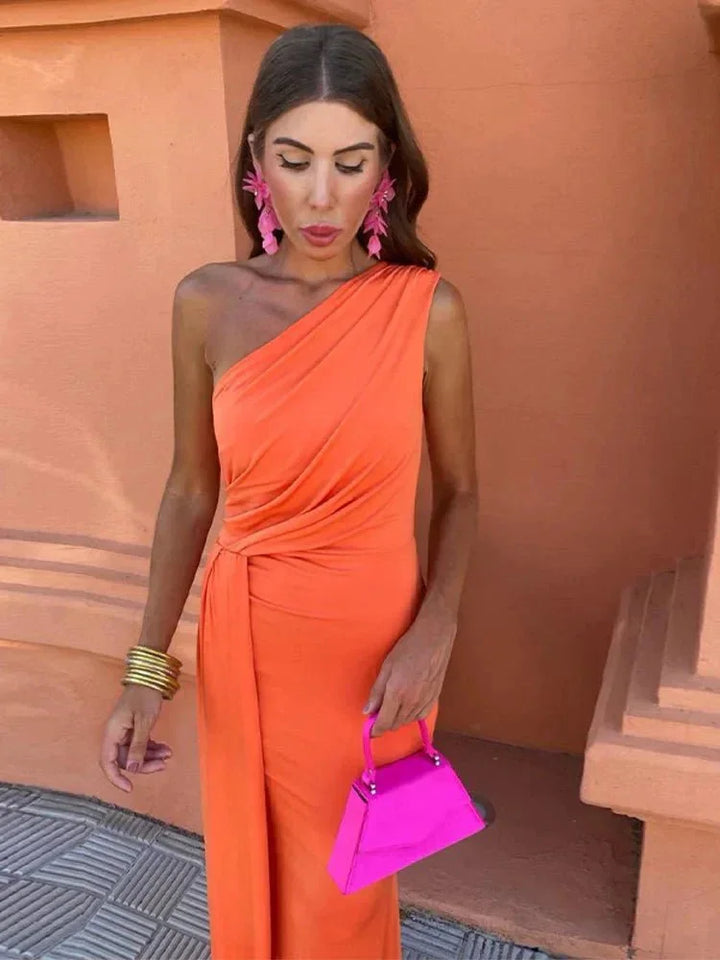 Women's elegant one-shoulder maxi dress, featuring delicate ruching and a graceful drape for formal events.