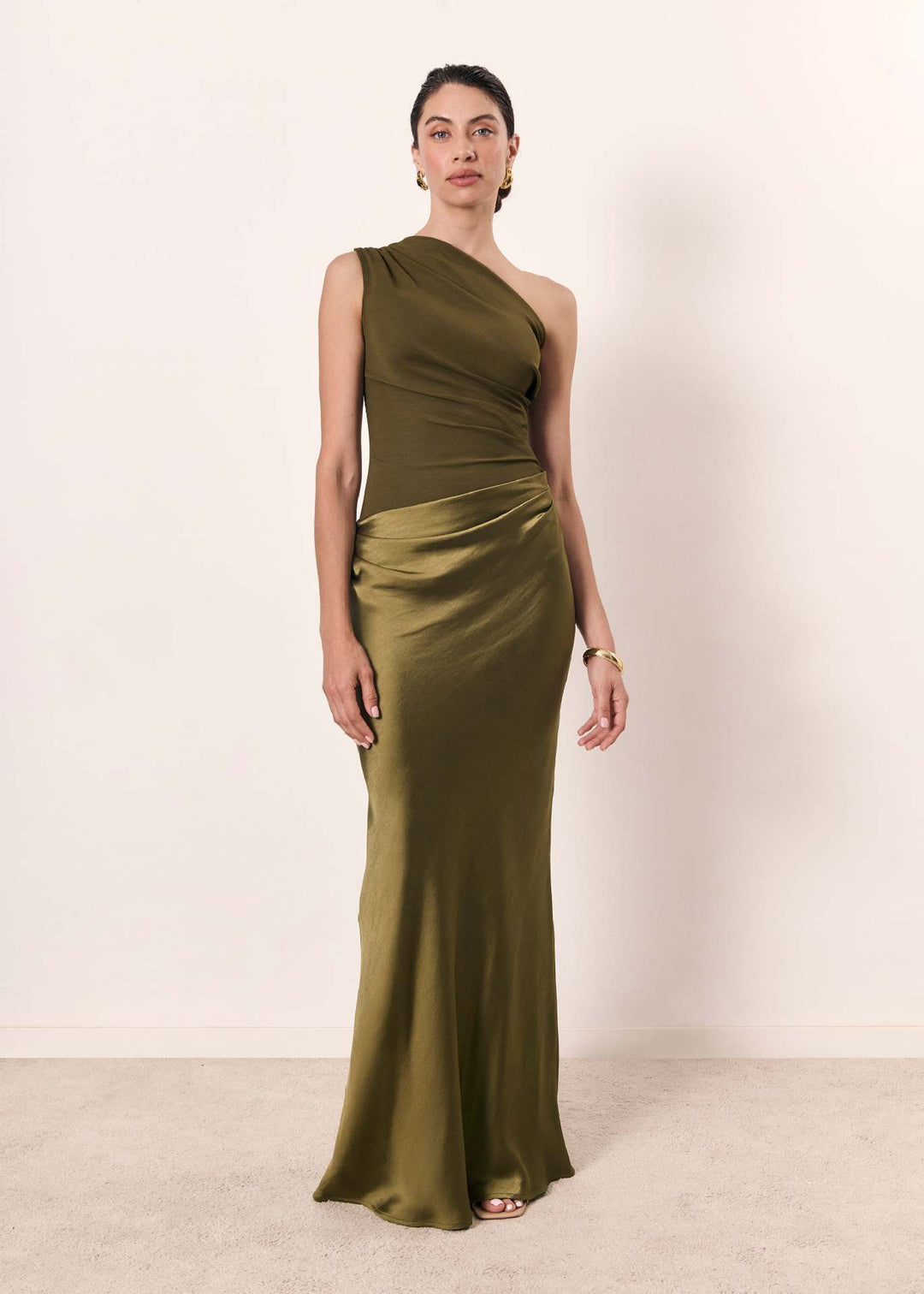 Stylish women's elegant one-shoulder ruched maxi dress, a formal long gown for evening events.