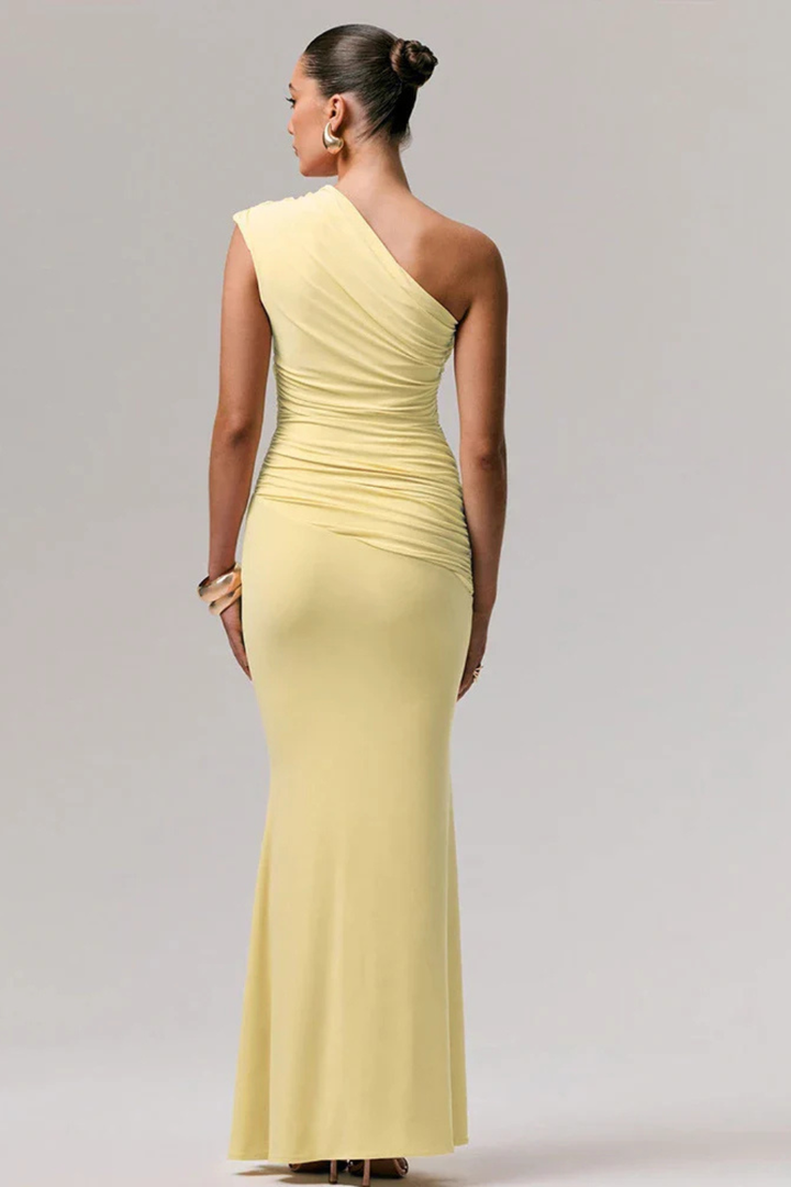Sophisticated women's one shoulder ruched maxi dress. Elegant evening wear or special occasion gown.