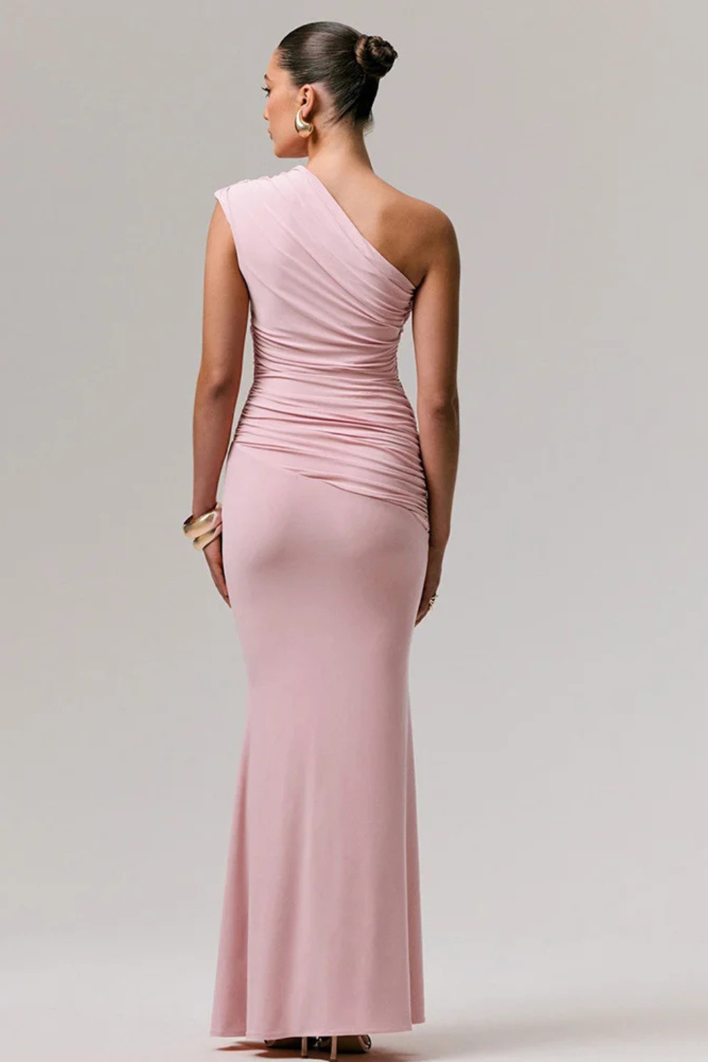 Women's formal one shoulder ruched maxi dress for graduation and evening events. Elegant and fitted.