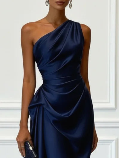 Modern one-shoulder midi dress with elegant ruched accents.