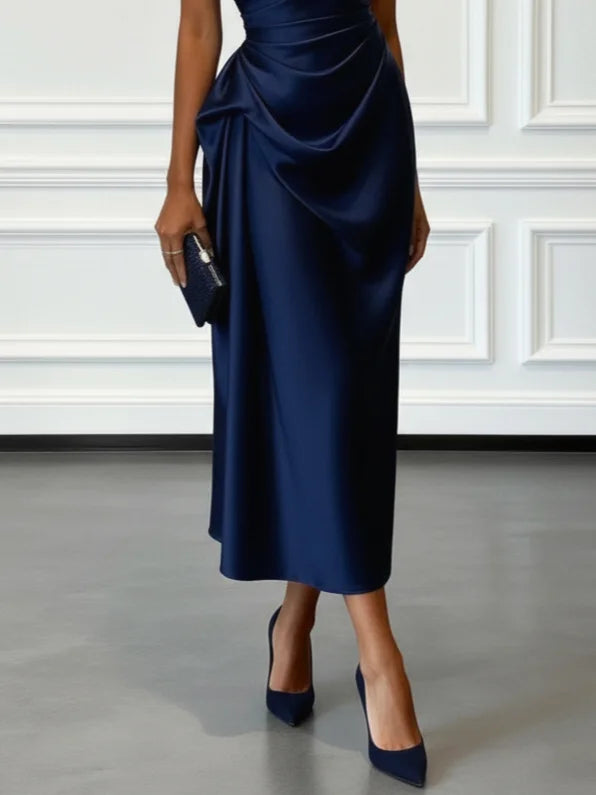 Fitted sheath midi dress, showcasing a trendy one-shoulder style.