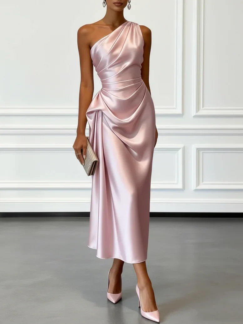 Sophisticated sheath midi dress with ruched one-shoulder detail.