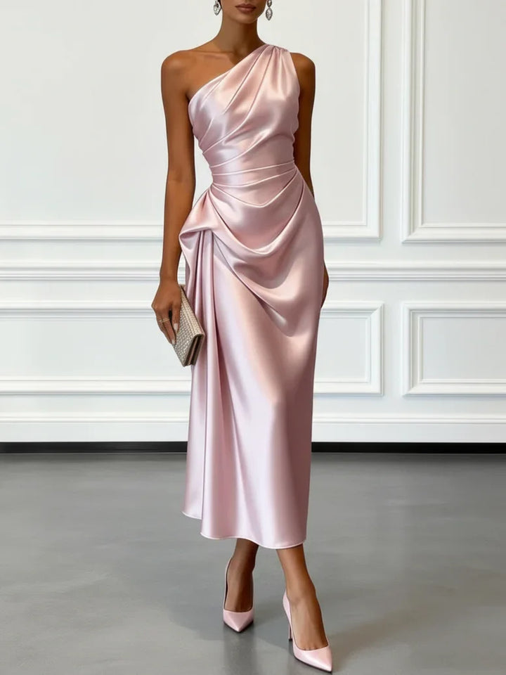 Sophisticated sheath midi dress with ruched one-shoulder detail.