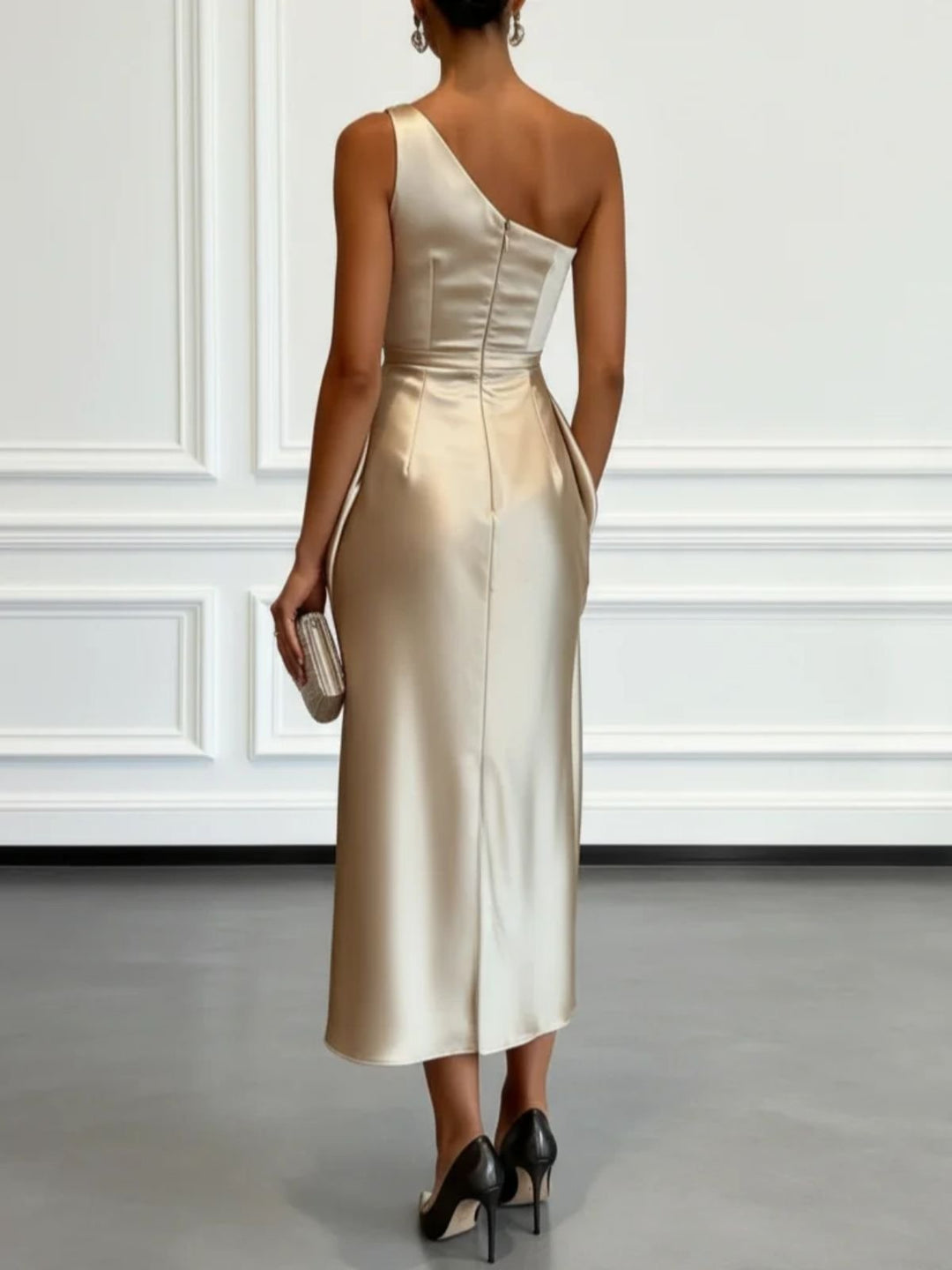 Stylish one-shoulder ruched wedding guest midi dress.