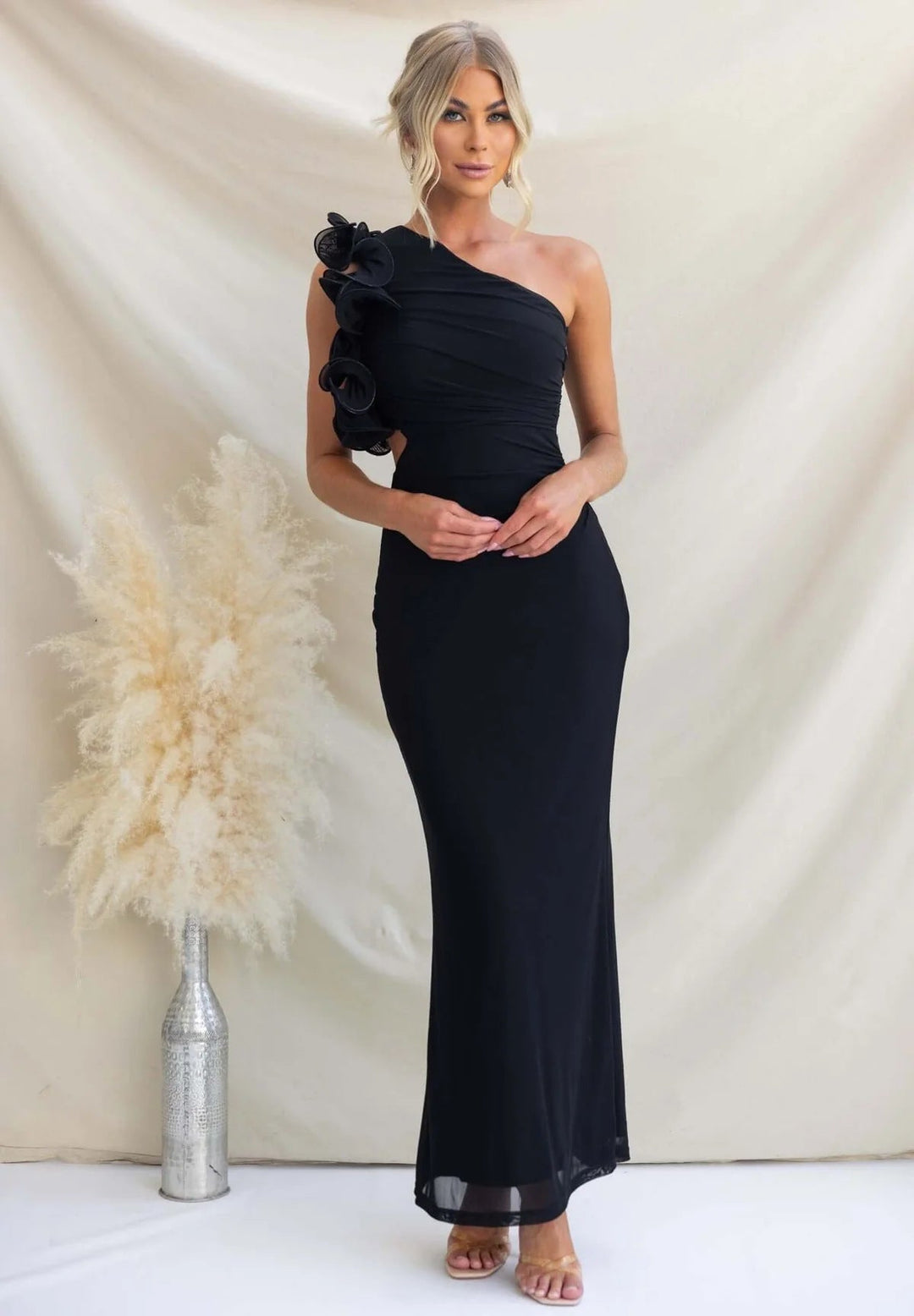 Stunning navy blue women's ruffled one-shoulder maxi dress, a sophisticated choice for wedding guests.