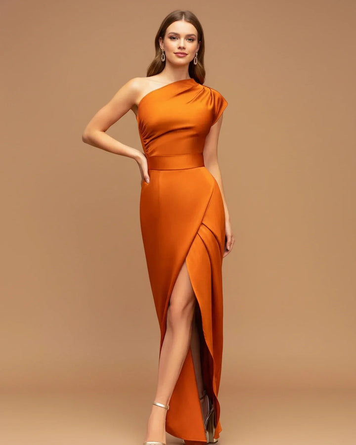 Stunning red one-shoulder formal maxi dress with a wrap front & leg slit, a sophisticated choice for a wedding guest.