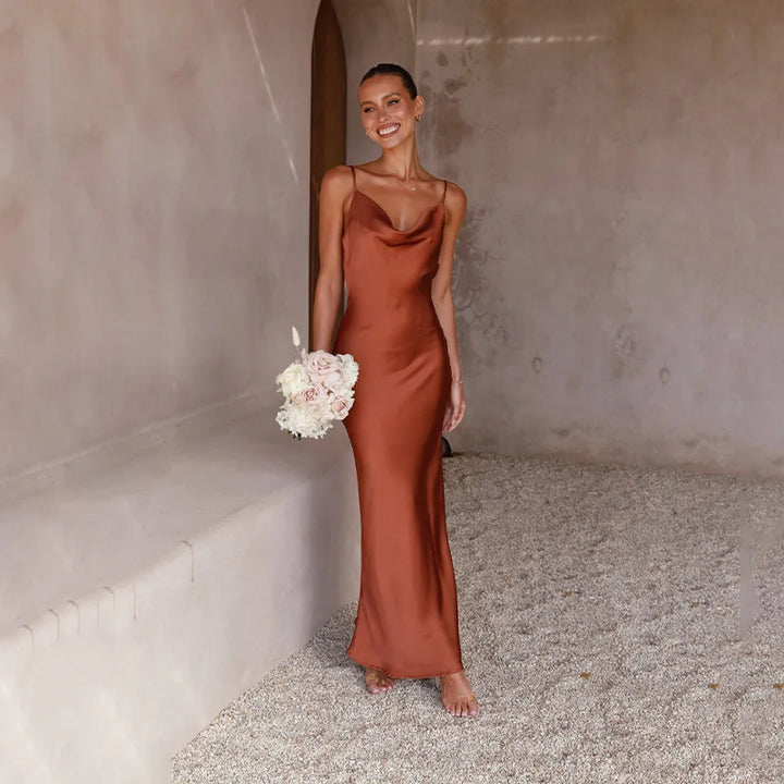 Elegant women's open back maxi dress, perfect for special occasions, evening events & wedding guests.