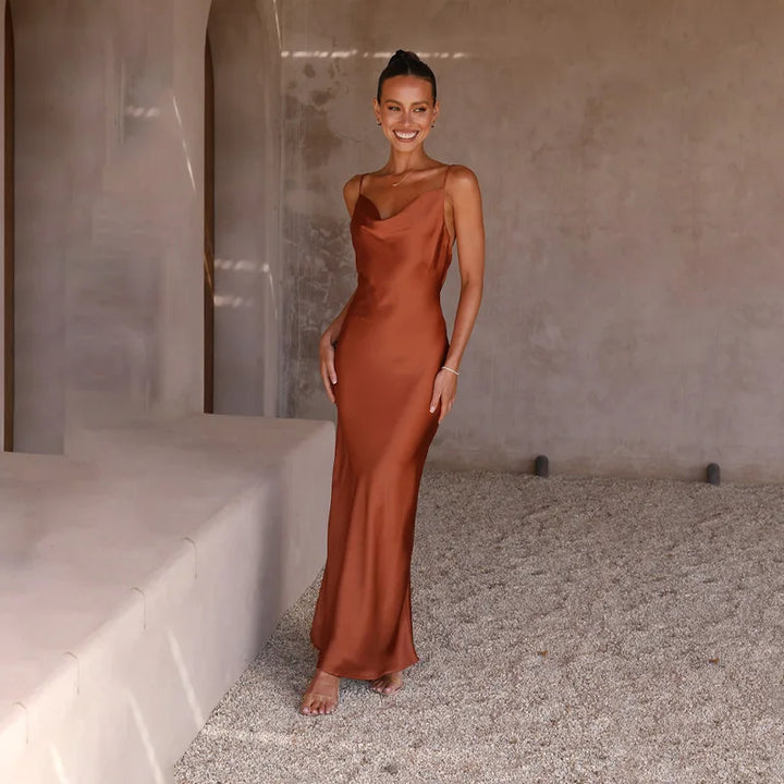 Stunning women's open back evening gown, a long elegant dress for any sophisticated event.