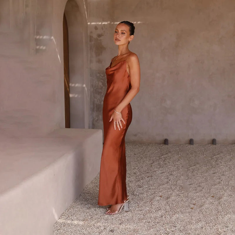 Beautiful women's long dress for special events, featuring an elegant open back & flowy silhouette.