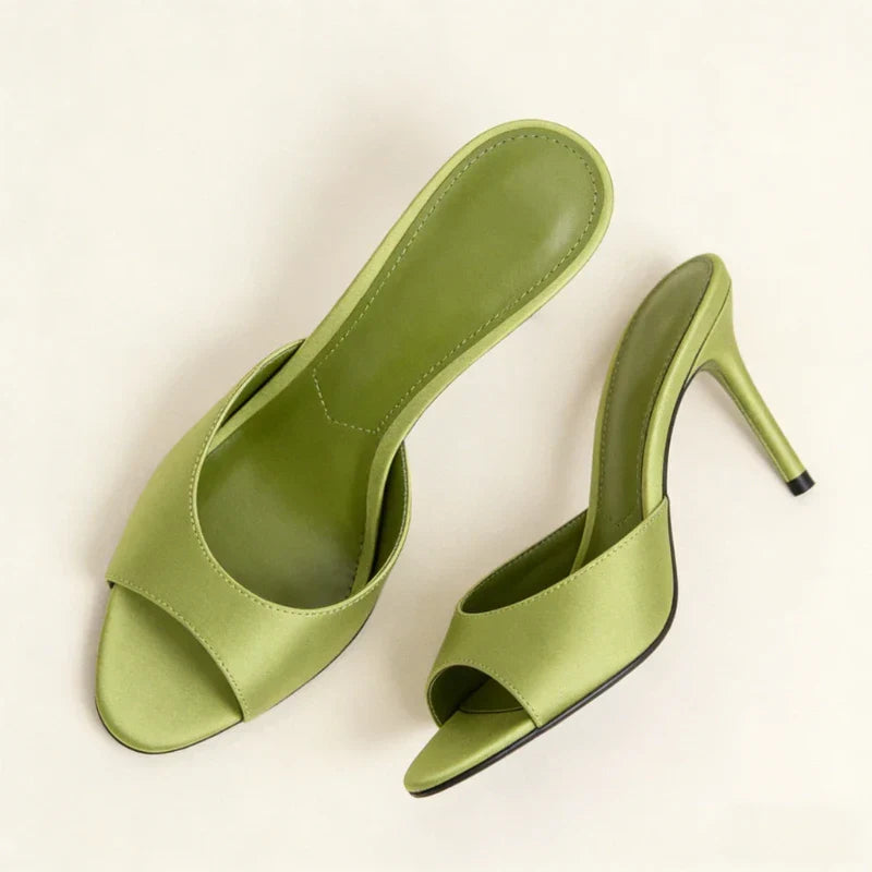 Stylish open toe high heel mules for women, featuring a sleek design & comfortable fit, ideal for events.