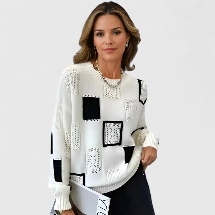 Elegant women's openwork knit sweater with round neck, perfect for chic spring & winter fashion.