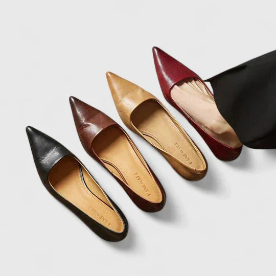Side view of women's comfortable orthopaedic heels with a sturdy block heel. Elegant everyday footwear.