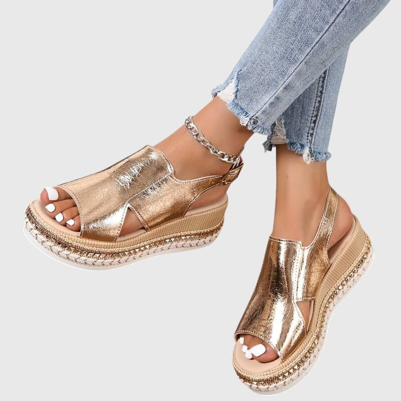 Comfortable gold orthopaedic sandals for women, featuring elegant design and essential arch support for daily wear.