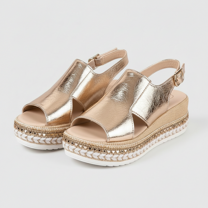 Stylish gold women's sandals, offering orthopaedic comfort and arch support. Perfect elegant footwear for summer fashion.