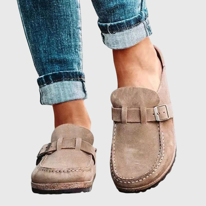 Elegant women's orthopedic clogs offer superior arch support & pain relief for daily comfort. Slip-resistant walking sandals.