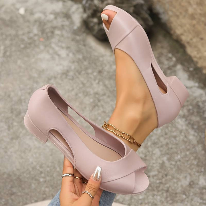 Black elegant orthopedic heeled sandals for women, ensuring comfort & arch support for daily wear.