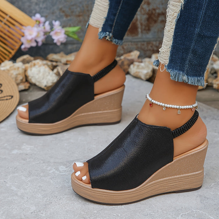 Stylish women's orthopedic wedge sandals. Features supportive arch, comfortable design & slip-resistant sole for casual wear.