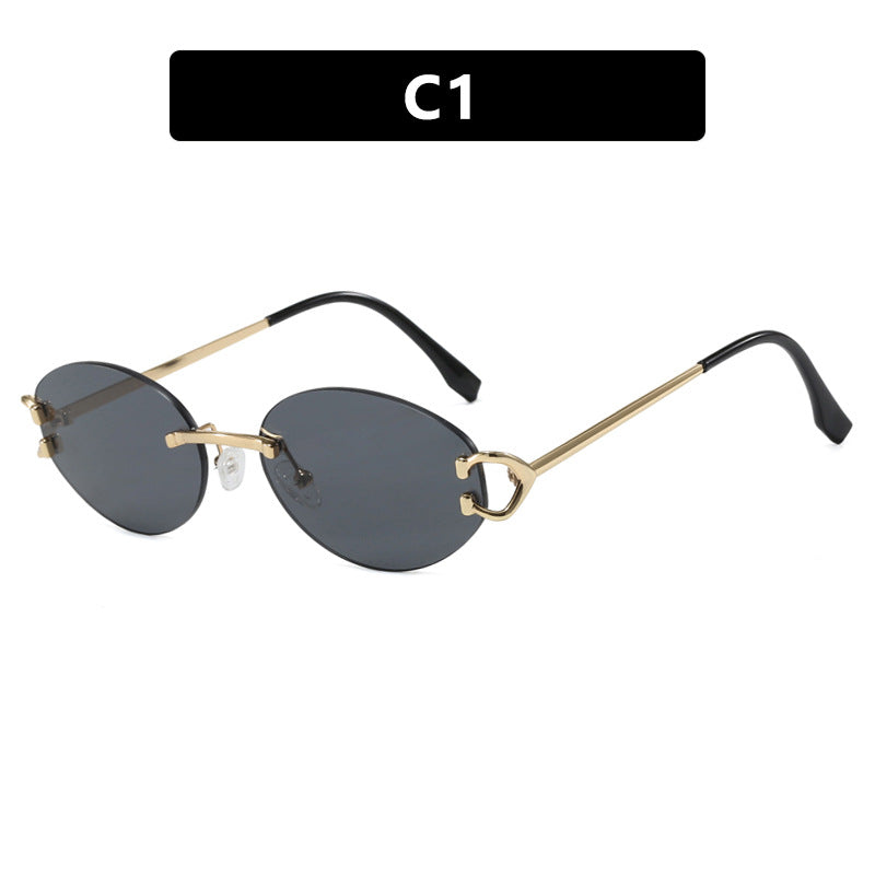Modern women's oval sunglasses with a sleek, chic frame, enhancing any trendy and elegant outfit.
