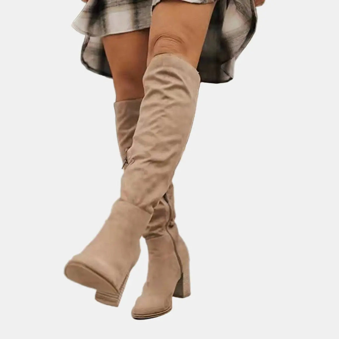 Elegant women's over-the-knee block heel boots, perfect for stylish autumn & winter fashion outfits.