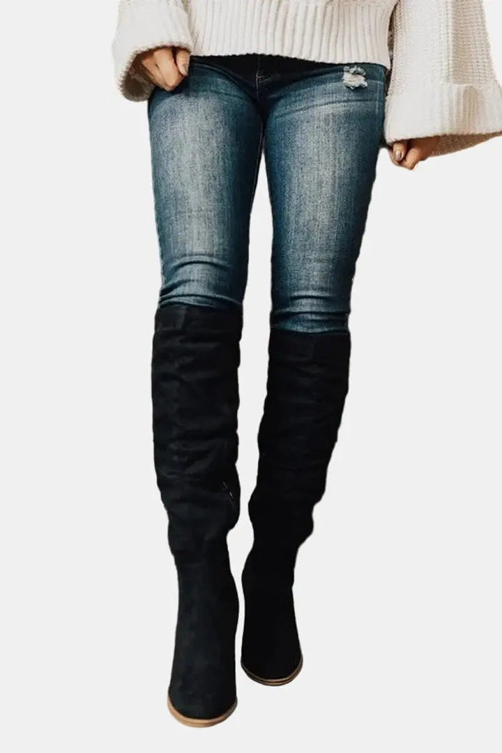 Stylish women's fashion boots: over-the-knee design with a stable block heel for autumn elegance.