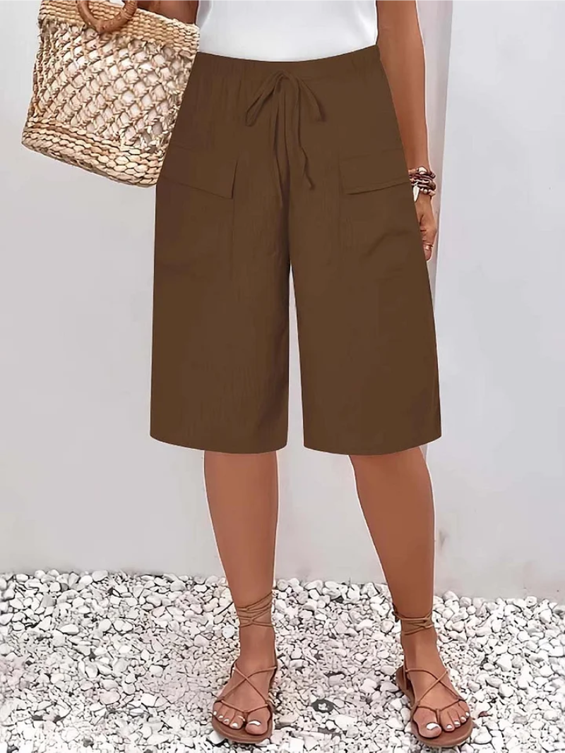Stylish women's oversized lace trousers with a comfortable, flowy fit. Perfect for elegant plus size fashion.