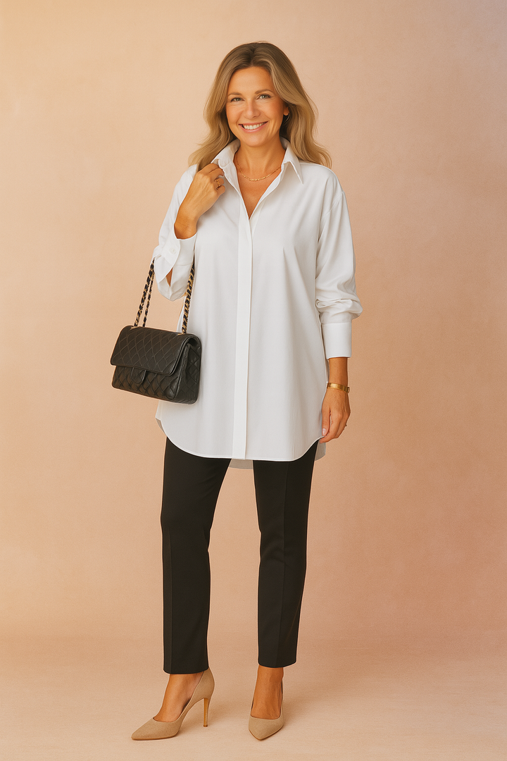 Elegant women's oversized shirt blouse with classic collar & long sleeves, perfect for chic versatile style.