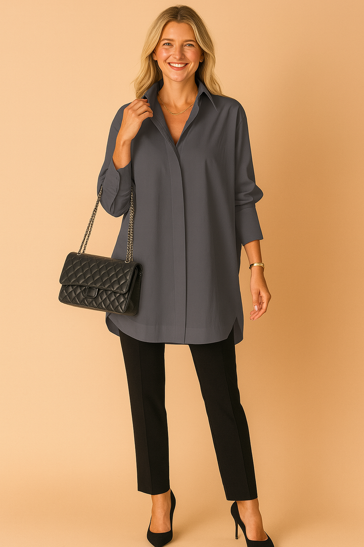 Modern women's oversized shirt blouse, a versatile long sleeve top for elegant casual wear & chic everyday style.