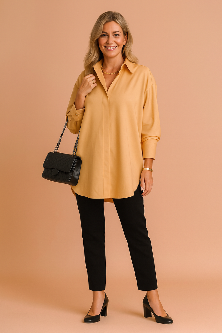 Sophisticated women's oversized shirt blouse, an elegant long sleeve top for a modern, chic, and versatile look.