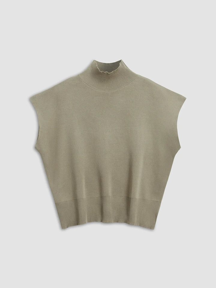 Women's versatile mock-neck sweater with elegant padded shoulders and fashionable cap sleeves.