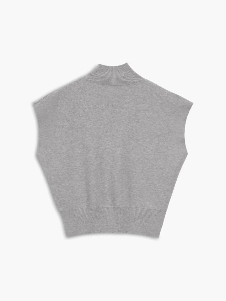 Women's elegant mock-neck cap sleeve top, perfect for a refined smart casual ensemble.