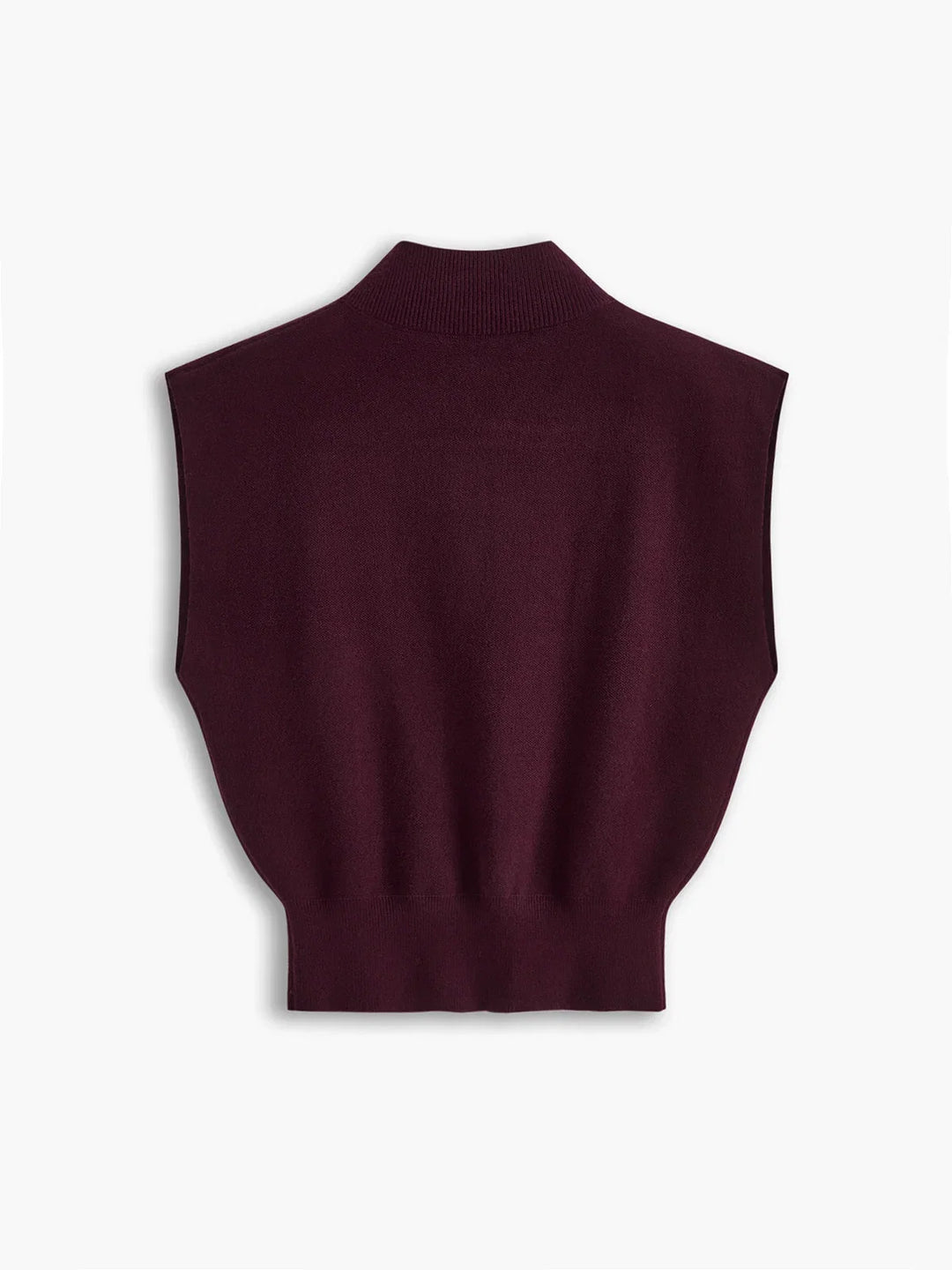 Chic women's solid color top with a mock neck, subtle padded shoulders, and flattering cap sleeves.