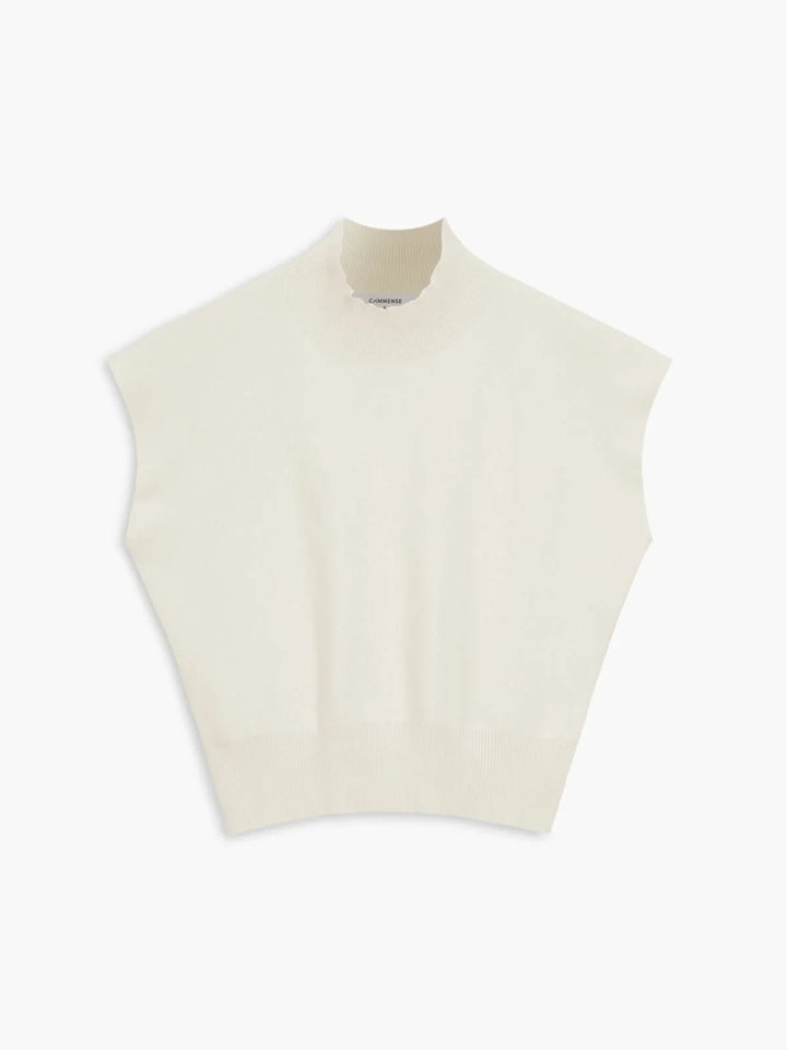 Smart casual women's top: mock neck, padded shoulders, cap sleeves. Elegant & structured.