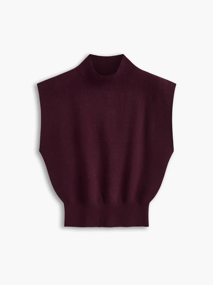 Sophisticated women's mock-neck sweater, featuring padded shoulders & cap sleeves for a chic look.